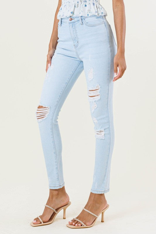 Mid Rise Distressed Ankle Jeans